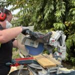 Participants working together to complete the build with Bosch tools