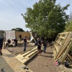 Participants working together to complete the build with Bosch tools